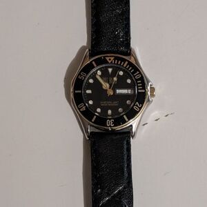 Bill Blass Black/Gold Watch